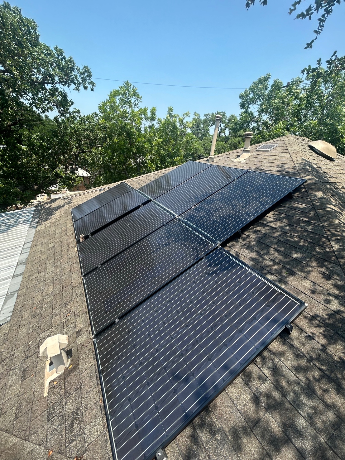 Sleek black solar panels installed on Texas residence
